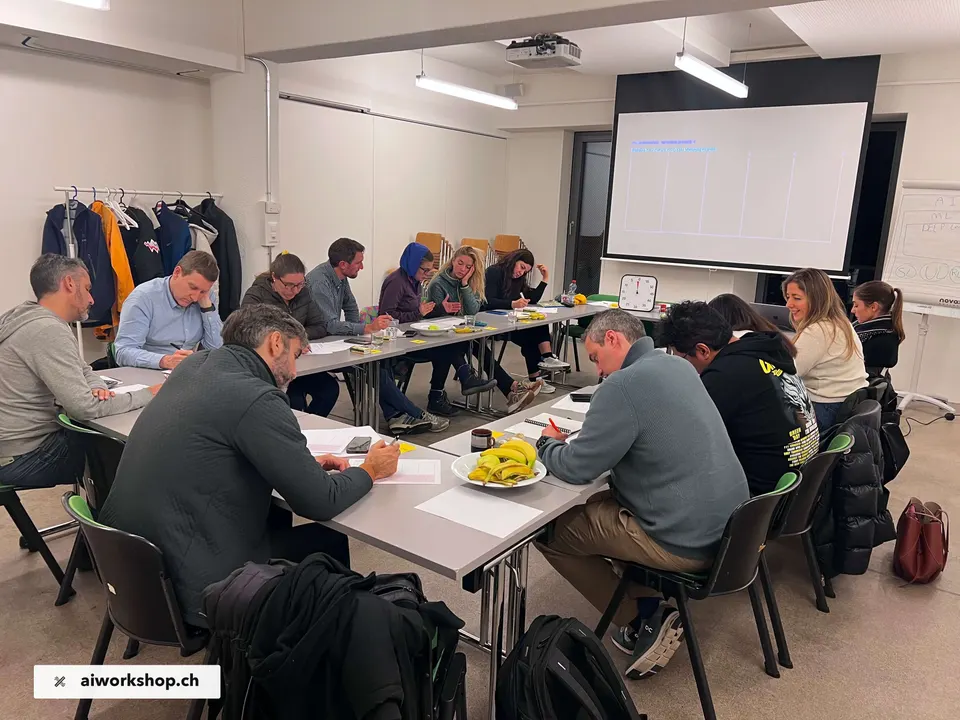 Teilnehmende arbeiten gemeinsam in einem AI Workshop in Lausanne