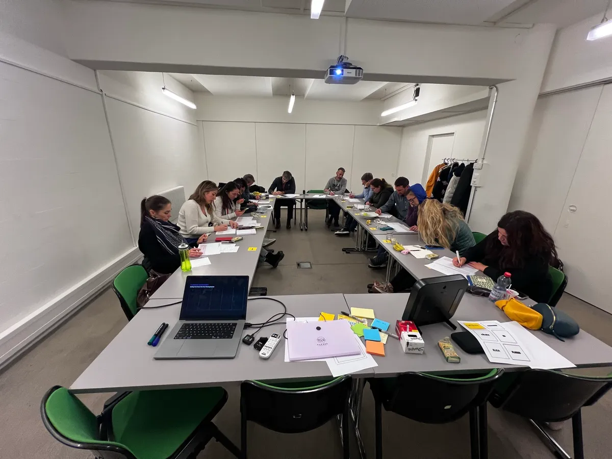 Wide view of a hands-on AI workshop in a university classroom